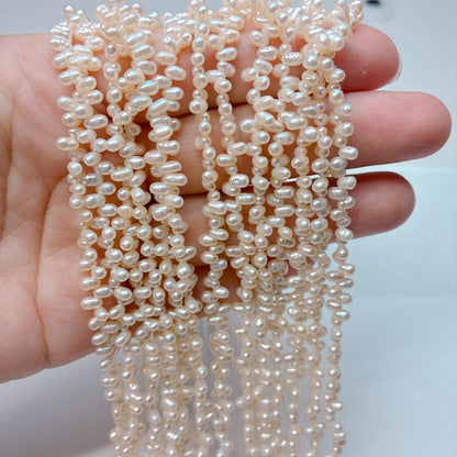 【横長ラインで差を付ける】希少なクレオ穴!アレンジ自在な白淡水パールの輝き(4.5x2.7mm/40cm) | P0055