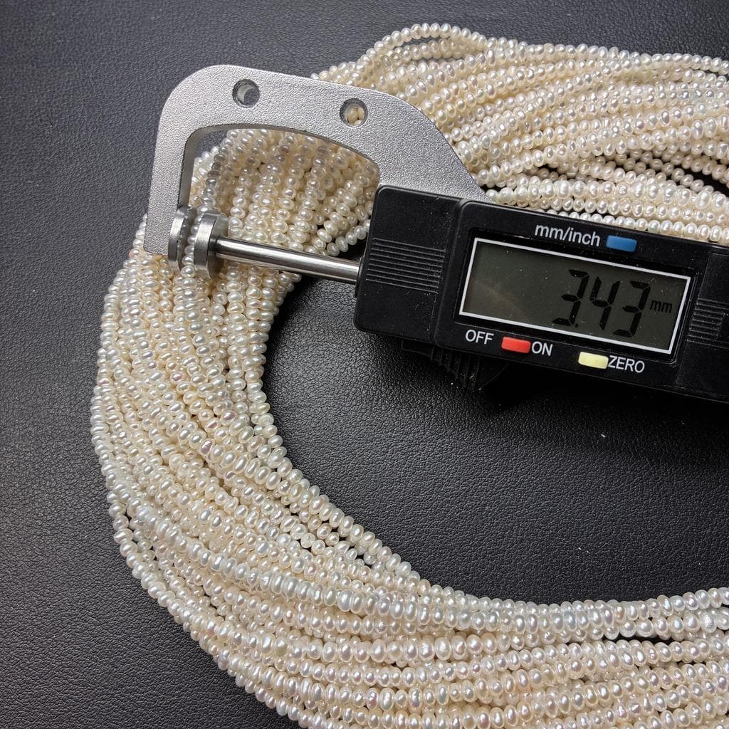 【王道の白】3-3.5mmの小粒が可愛らしい!万能なポテト型白淡水パール(39cm) | P0057