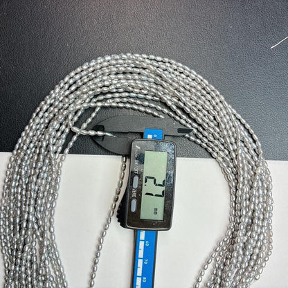 【シックな輝き】洗練されたニュアンスグレー!アレンジ自在なライス型淡水パール(40cm) | P0059